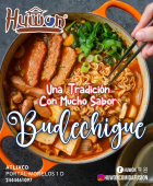 Fideos de cristal salteados con una mezcla de verduras y carne de res, condimentados con salsa de soja y aceite de sésamo. - Huwon