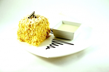 Pastel de Queso y Coco Individual - La Postrería - Puebla